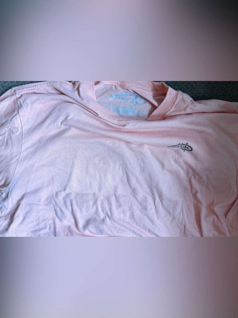 2 fishing shirts. REEL Life- one long sleeve one shirt. SPF.